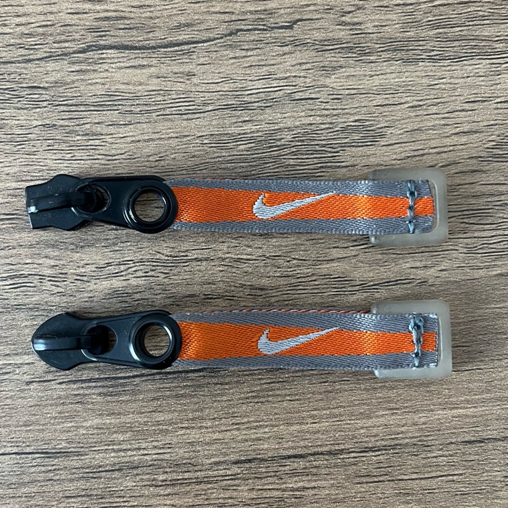 2 x Nike Logo Golf Bag Orange Zipper Pulls 2.75 Long Lot of 2 Swoosh Rubber Tip